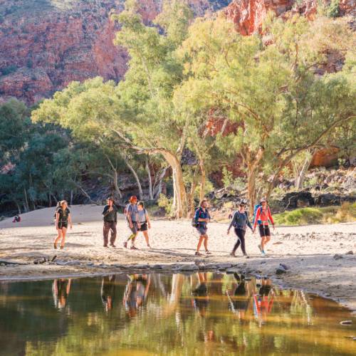 Hiking beside one of the many waterholes along the Larapinta Trail