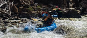 Heading down a rapid on the Mersey River